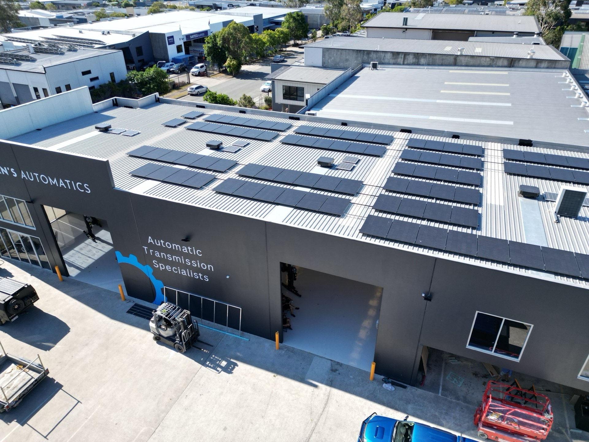 Drone view of a commercial solar system on the Dean's Automatics building