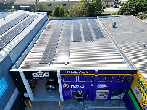 Aerial view of a commercial solar installation on the Battery World store roof